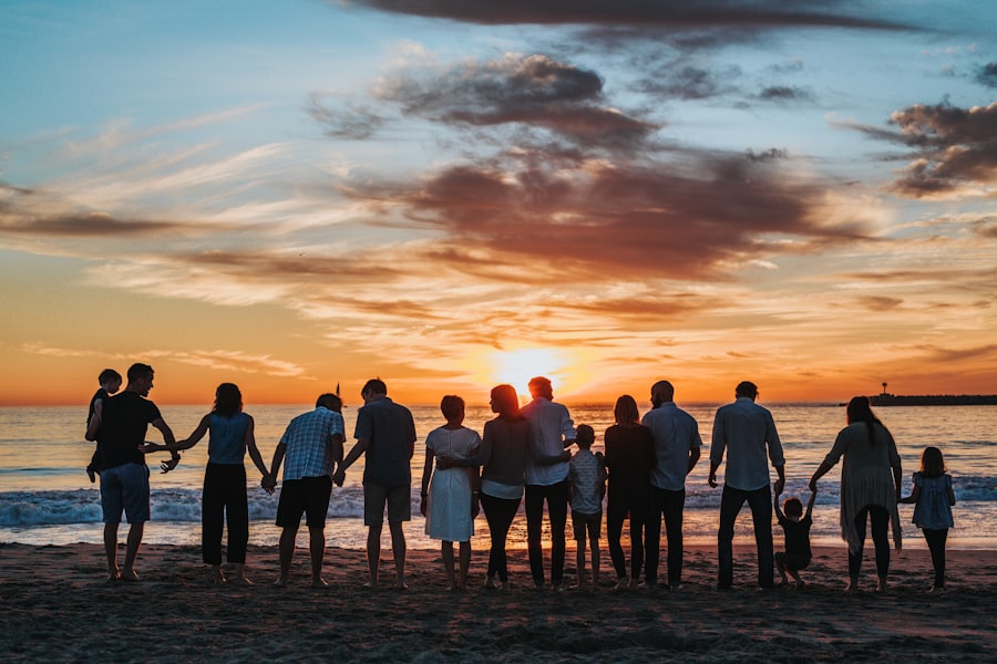 A family together at the Florida shoreline at sunset